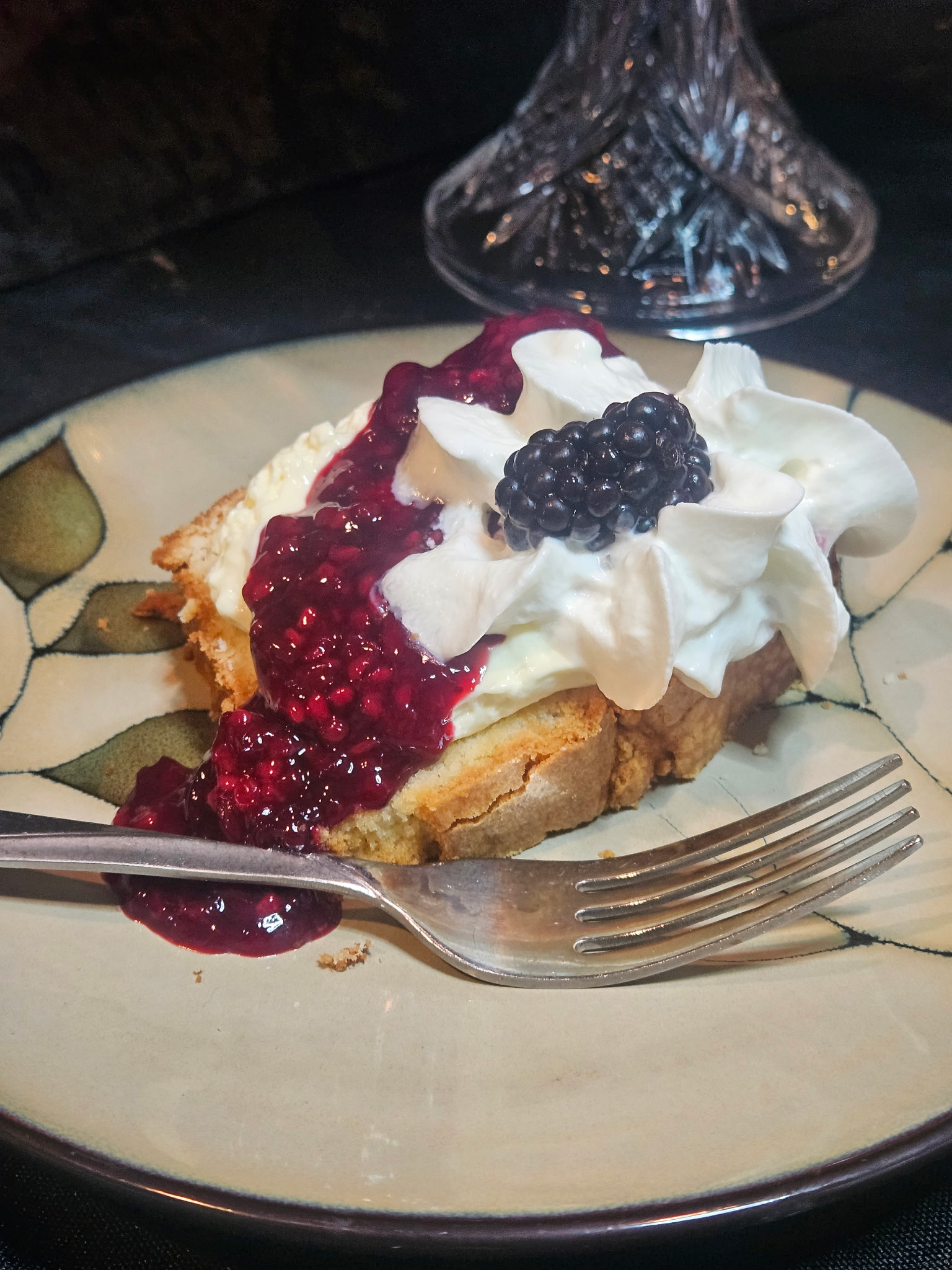 Pound cake slice with blackberry topping